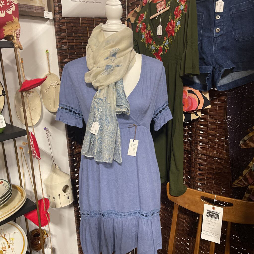 Wild Blue. Dress with sleeve and bottom details
