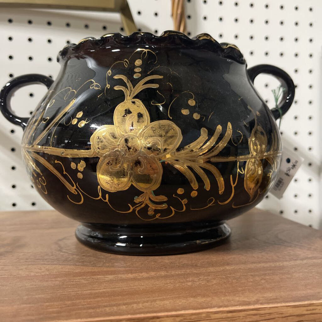 black and gold painted bowl with handles
