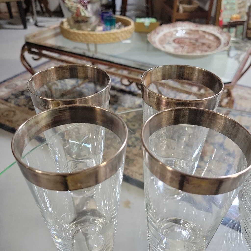 Set of 4 tall silver-rimmed glasses