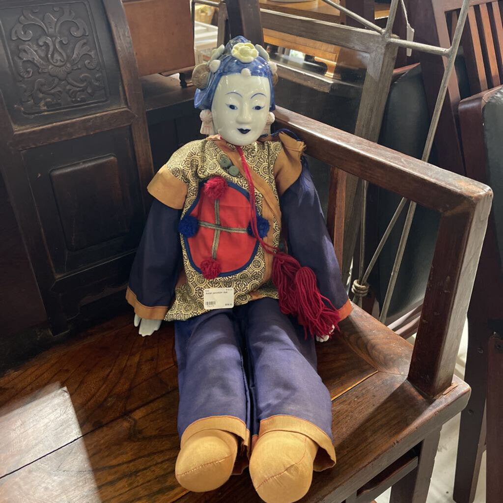 Asian porcelain doll