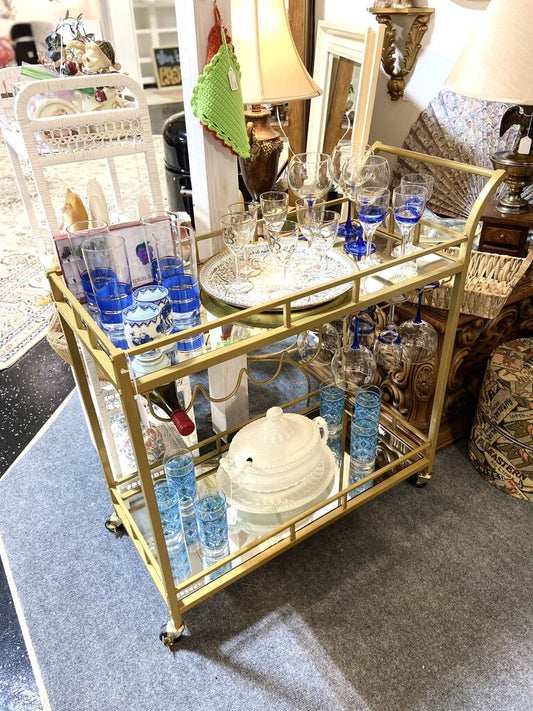 Gold metal and mirror wine cart