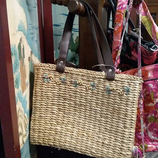 Purse straw bag with brown handles and beaded fruit