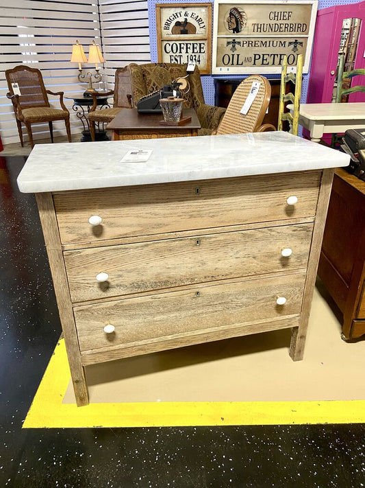 Marble top bleached dresser