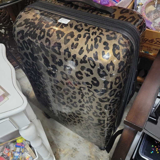 Large leopard print suitcase