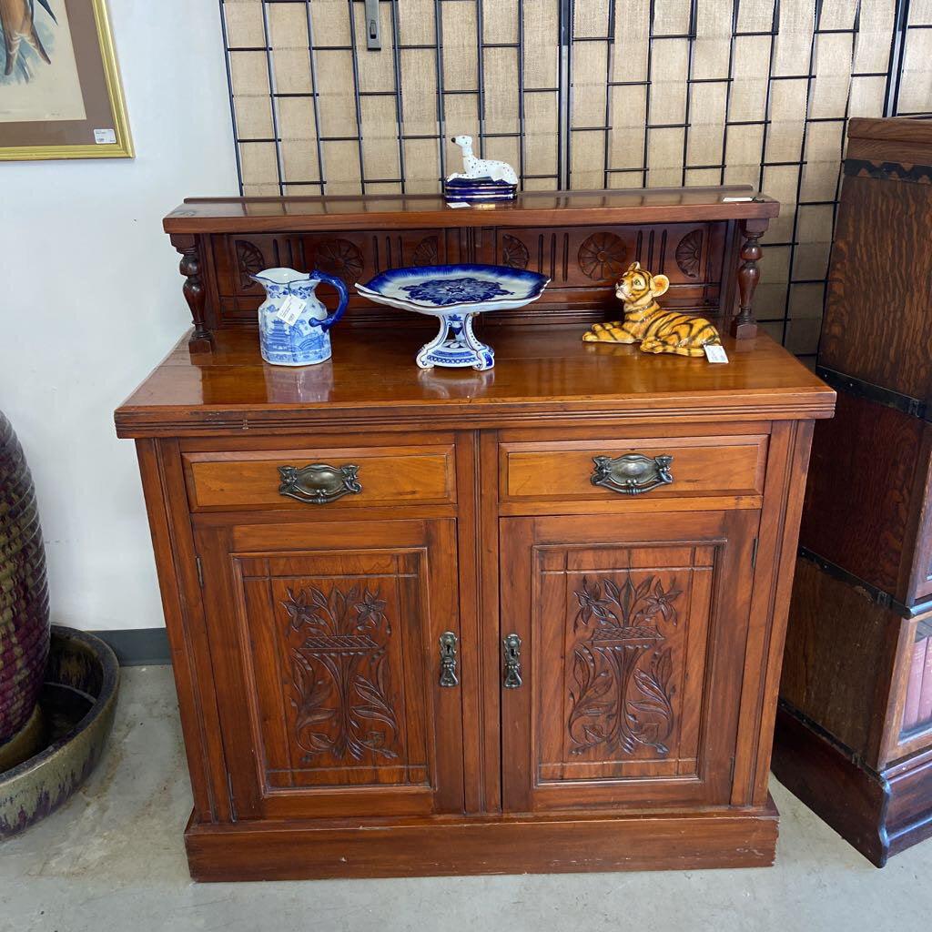 antique wooden buffet with carved doors